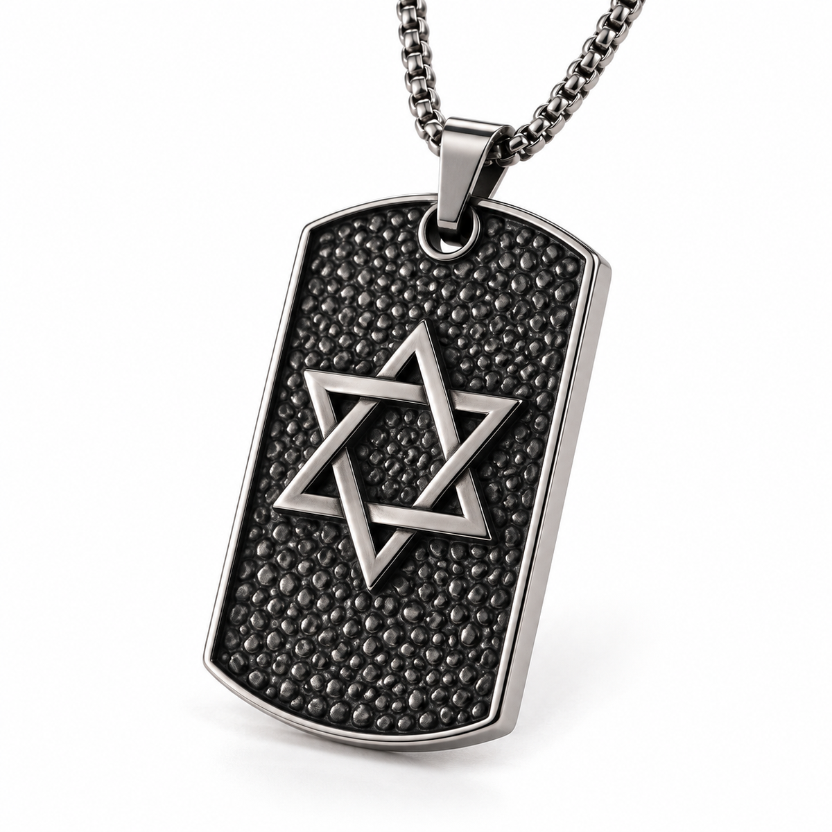 Close-up of the pebbled dog tag texture and polished Star of David